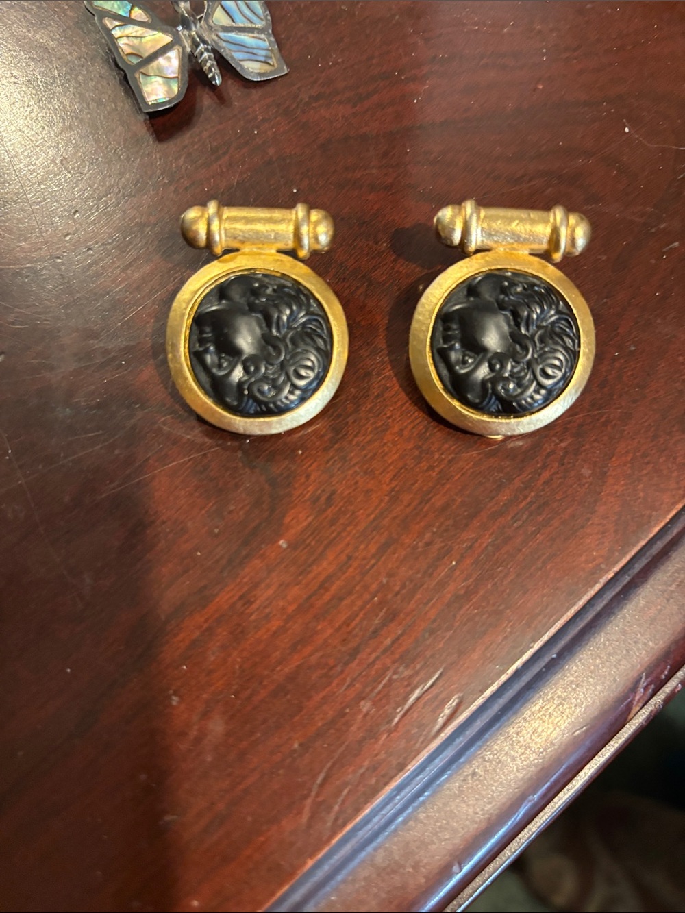 earrings designer brand on back